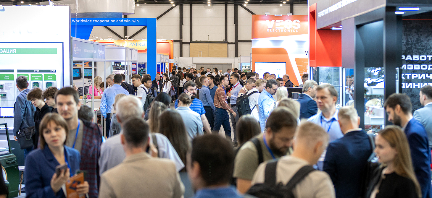 Photo from the RADEL 2025 exhibition, visitors at the stands